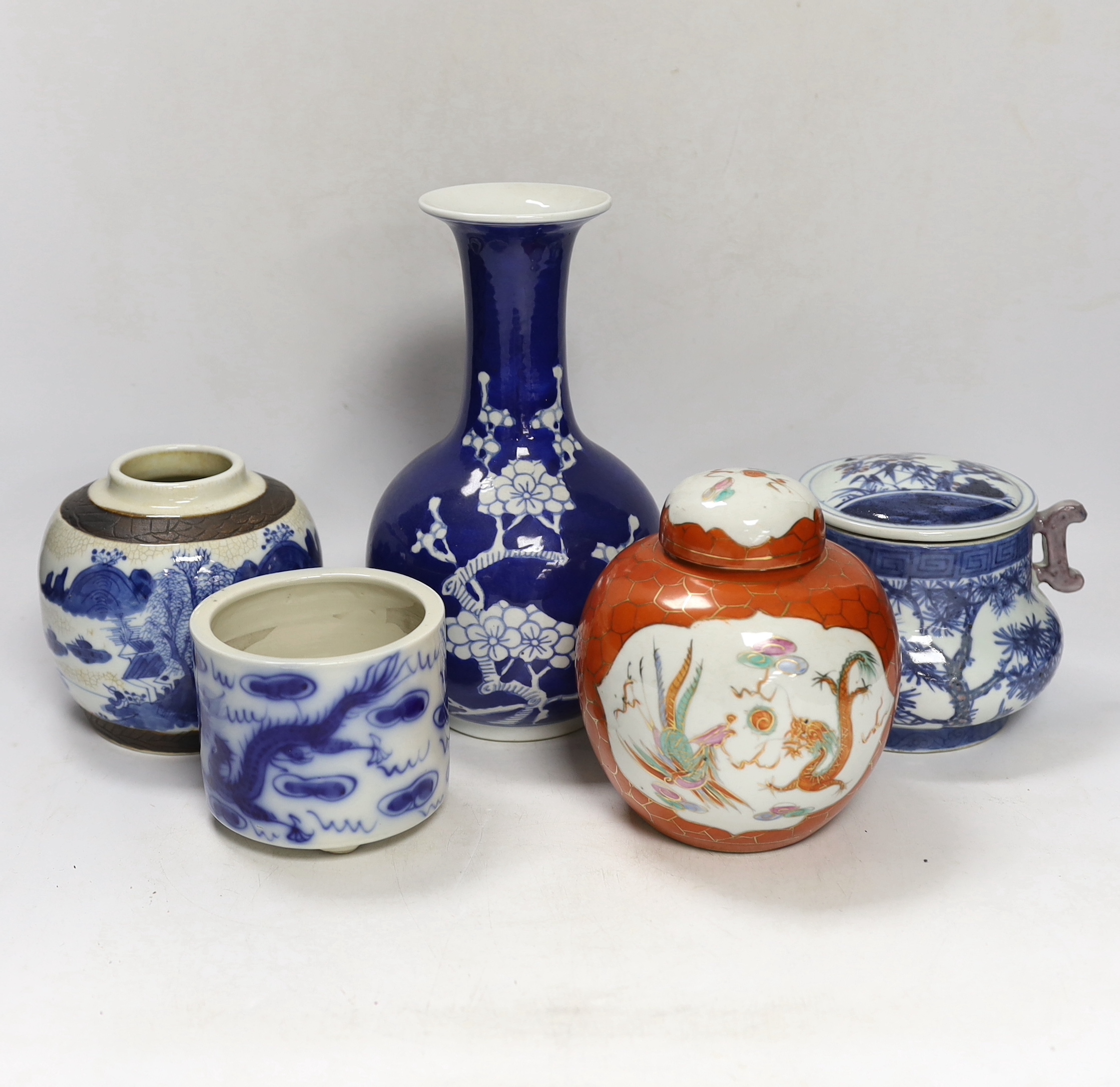 Two Chinese famille rose jars, a similar pot with cover, a brush pot and a vase, 18th century and later, tallest 24cm (5)